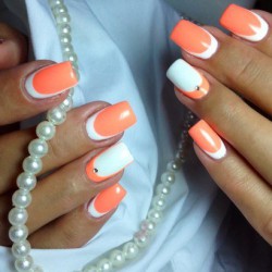 Coral and white nails photo