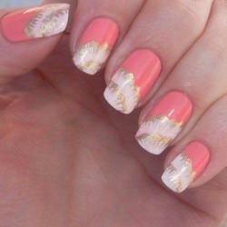 Nails under coral dress photo