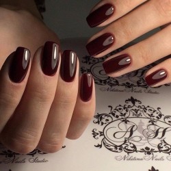 Manicure with a dark shellac photo