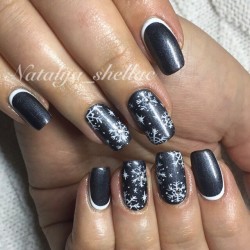 Nails by a dark blue dress photo