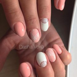 Peach nails with a picture photo