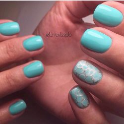 Turquoise nails with sparkles photo