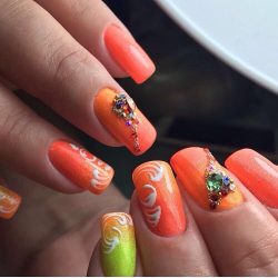 Nails with orange color photo