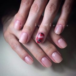 Nails with red flowers photo