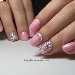 Pink nails with stones photo