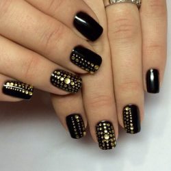 Black nails with rhinestones photo