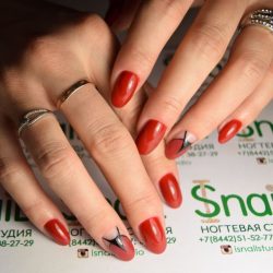 Red gel polish for nails photo