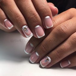 White half moon on nails photo