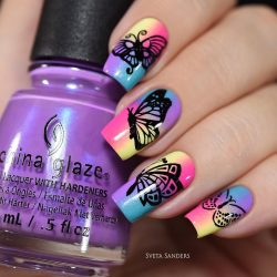Festive nails with a butterfly photo
