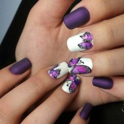 Nails with butterfly wings photo