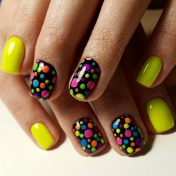 Yellow nails with black pattern photo