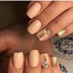 Beige nails with stones photo