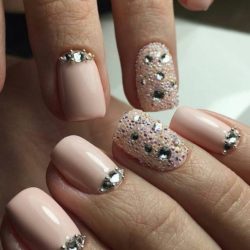 Nails with liquid stones photo