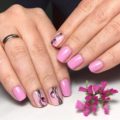 Manicure on a pink background