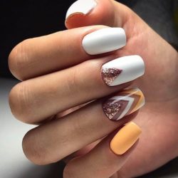 Orange and white nails photo
