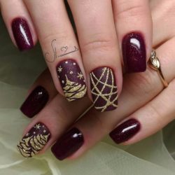 Festive maroon nails photo