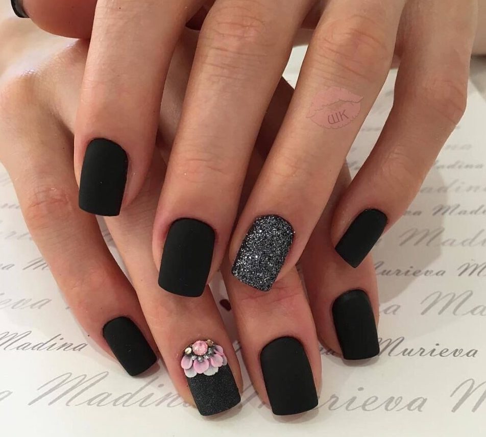 Black nail polish with sparkles