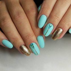 Turquoise nails with sparkles photo