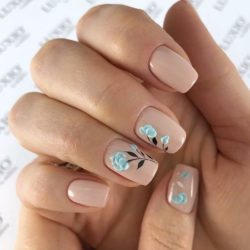 Nails with blue flowers photo