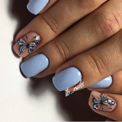 Blue nails with butterfly photo