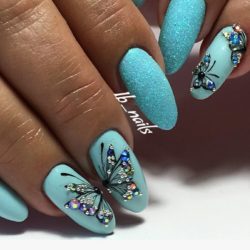Blue nails with butterfly photo