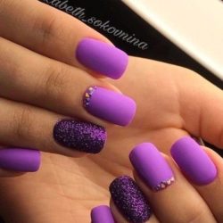 Purple nails with sparkles photo
