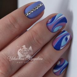 Nails with wavy lines photo