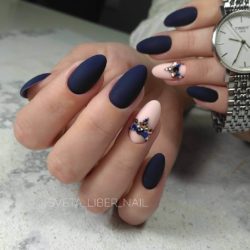 Black and white nailі with rhinestones photo