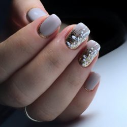 Nails with golden glitter photo