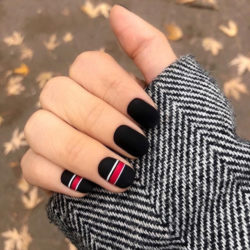 Black nails with a picture photo