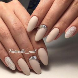 Beige nails with rhinestones photo