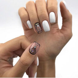 White nails with black pattern photo