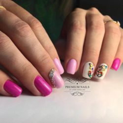 Nails with butterfly and rhinestones photo